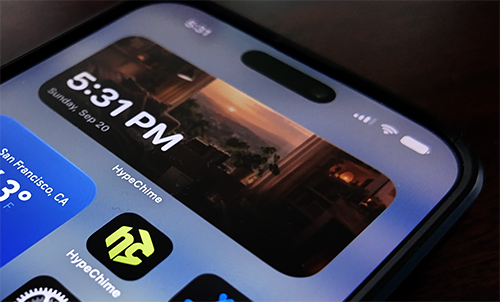 HypeChime Home Screen widget with cinematic ambient clock poster artwork on iPhone